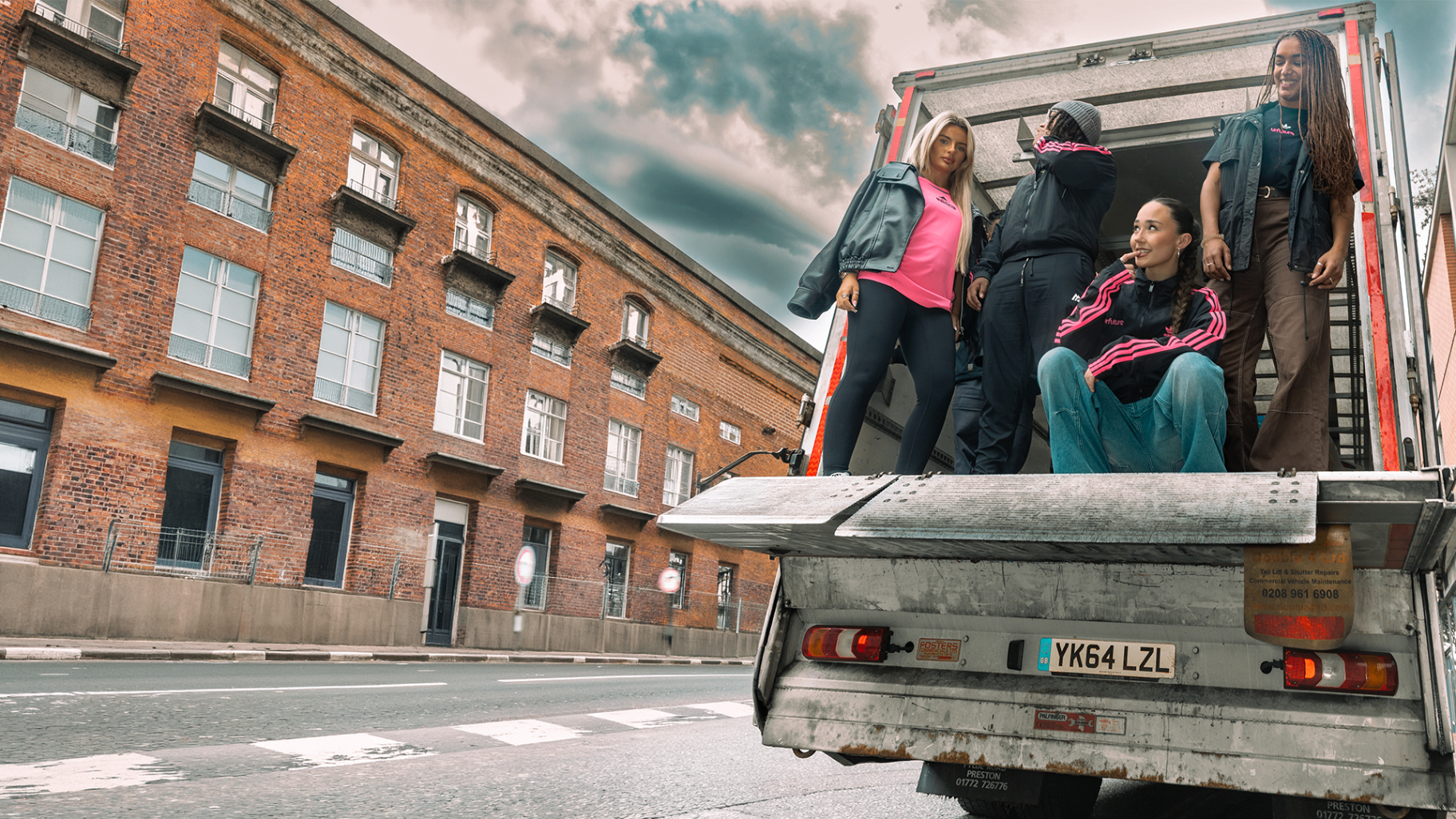 Young people from the urfuture community on a truck lift